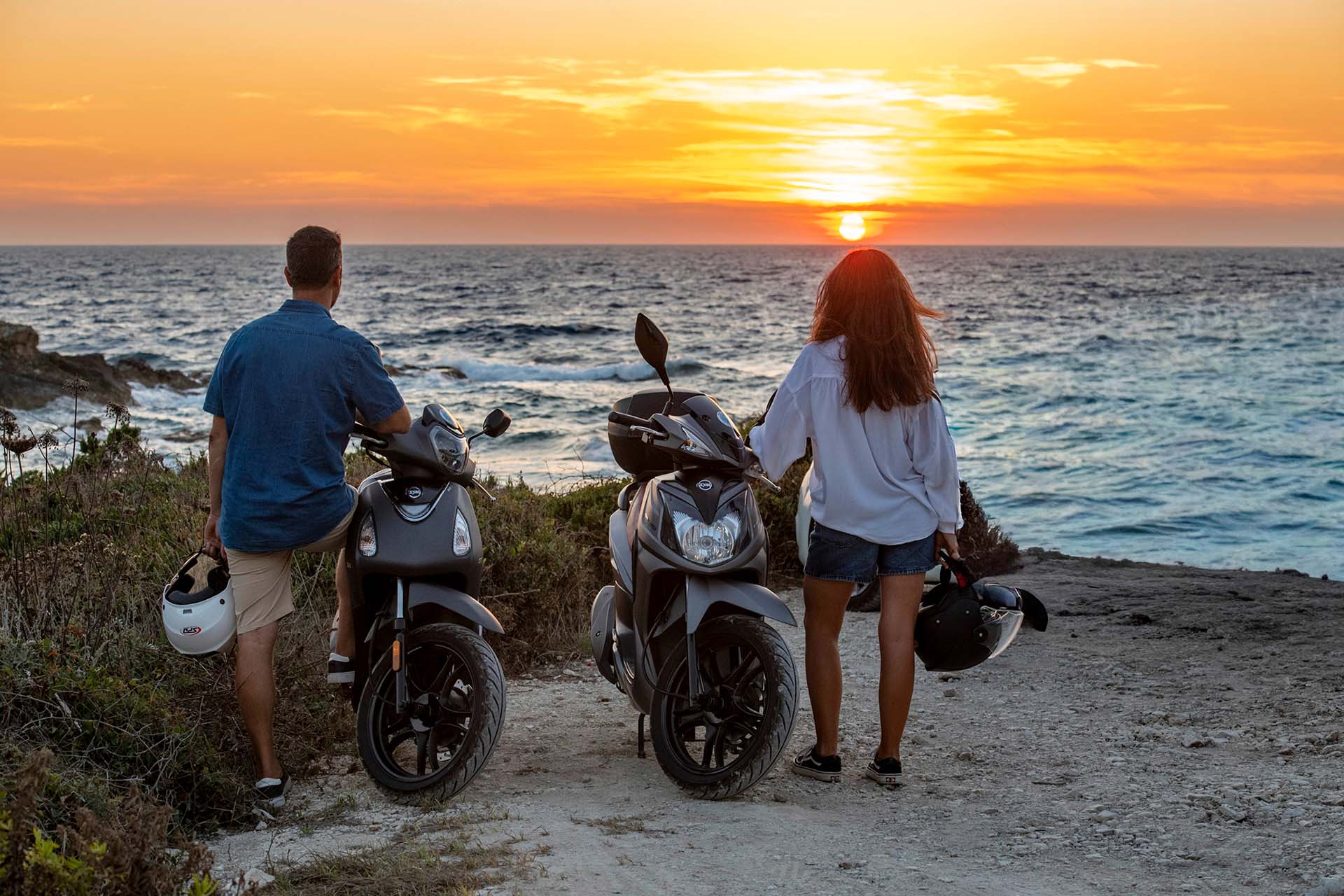 Moto Paxos picture of couple enjoying the view