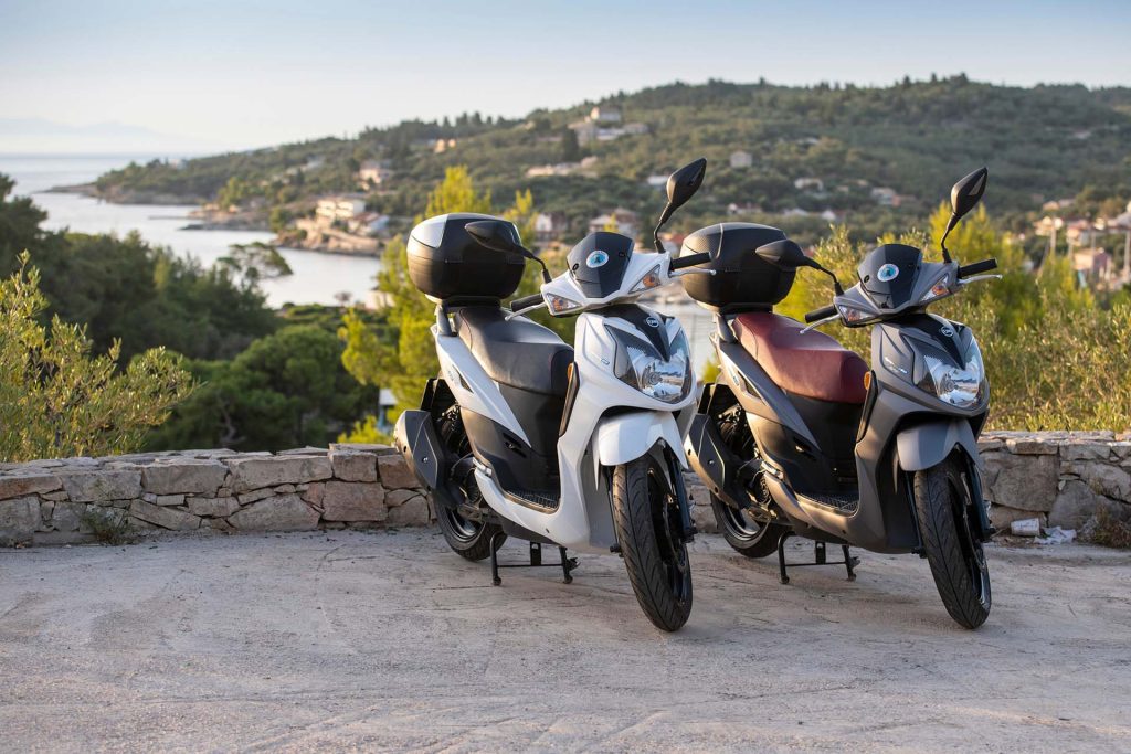 Moto Paxos photo with gey and white scooters